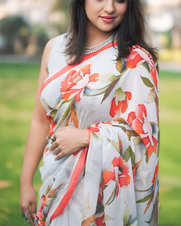 Handpainted pure chiffon silk saree laden with peonies