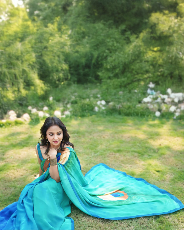 hand painted, pure crêpe, Silk saree in peacock shades.