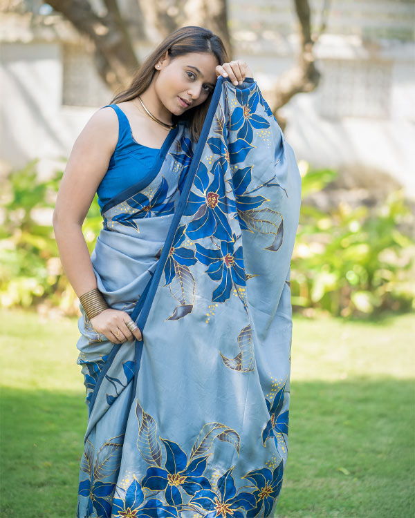 hand painted pure soft silk saree in grey base and blue flowers