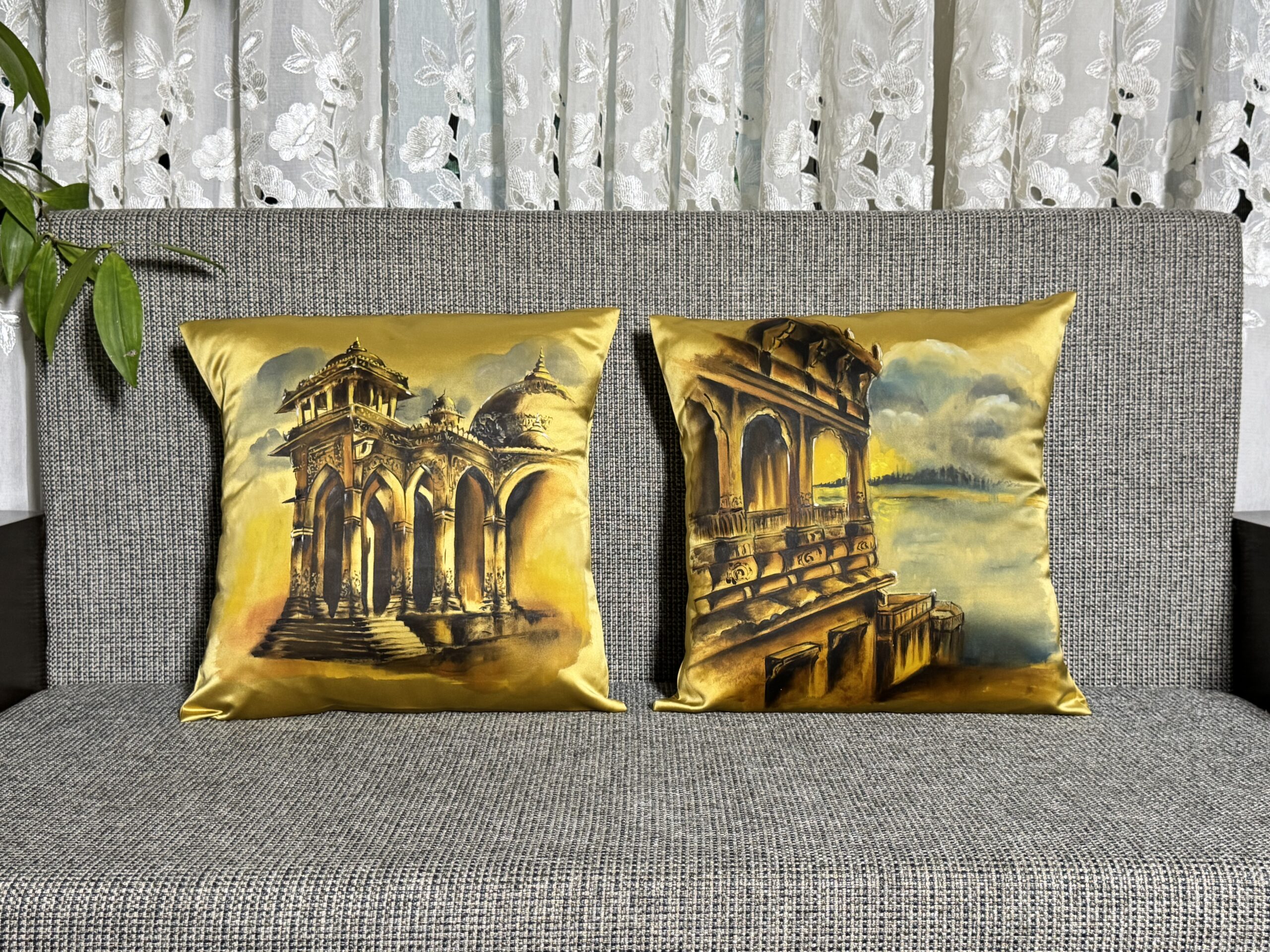 A set of decorative cushion covers featuring hand-painted Indian heritage architecture and sculptures.